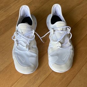 Used white Nike Free trainer shoes